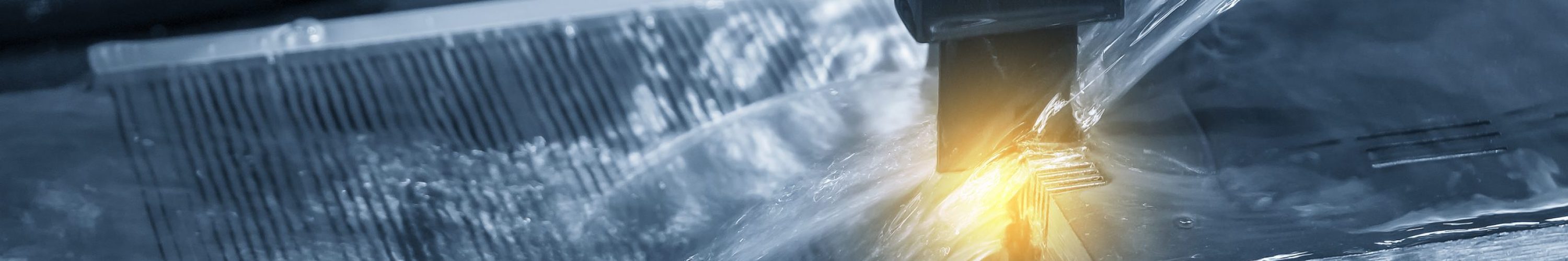 The EDM machine operation with the lighting effect. The machining mold and die by  EDM graphite electrode.